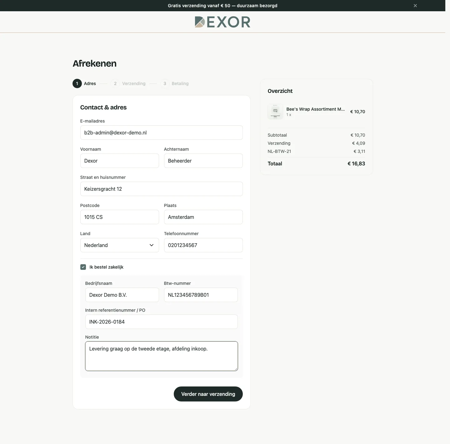 De eerste stap van de checkout in de demowinkel met een vinkje Ik bestel zakelijk en daaronder velden voor bedrijfsnaam, btw-nummer, intern referentienummer en een notitie